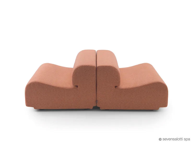 Two coral Arflex Bobo seats back to back, side view