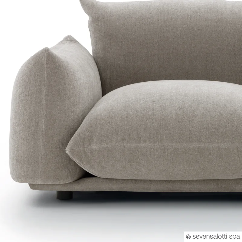 Detail of the Arflex Marenco sofa: armrest and cushion, grey