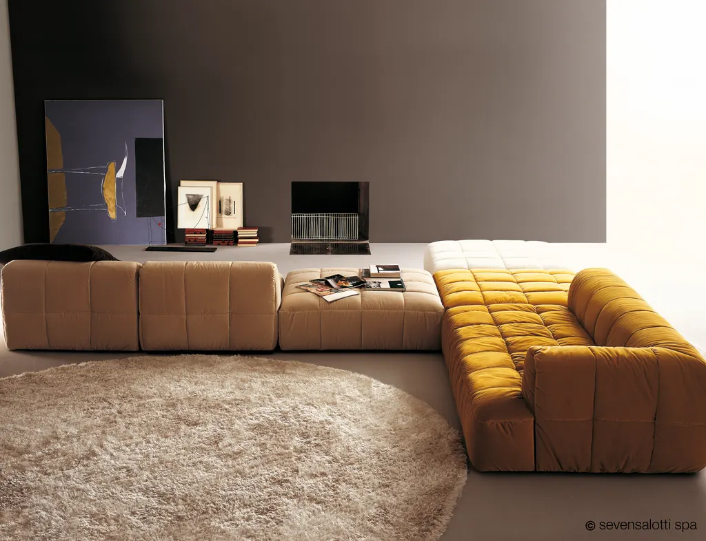 Mustard and beige Arflex Strips corner composition on a round rug